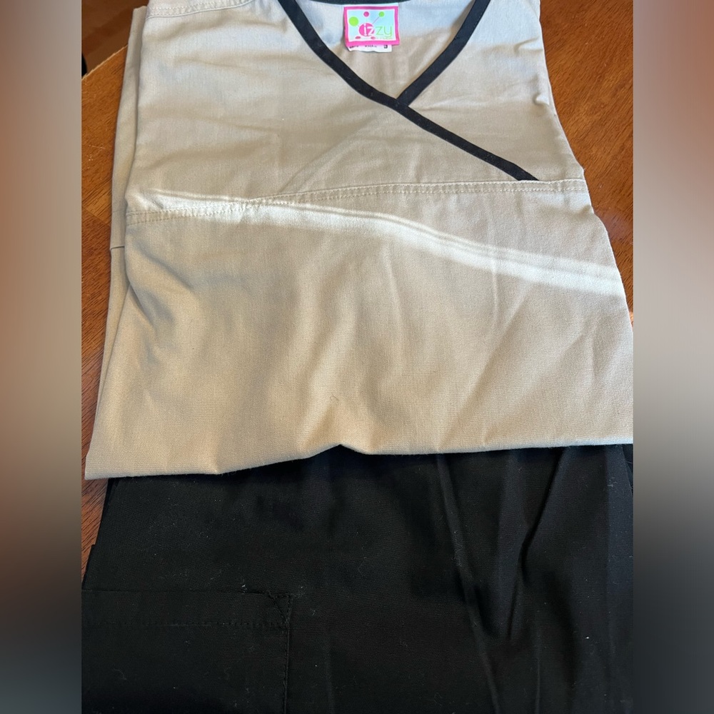 Black and Tan Scrub Set by IZZY Scrubs.